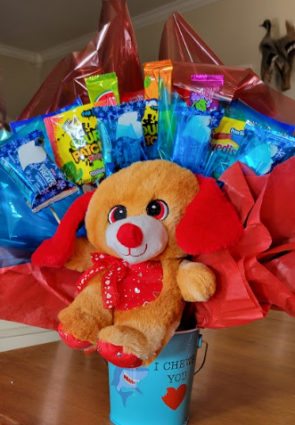 Dog in candy boy basket